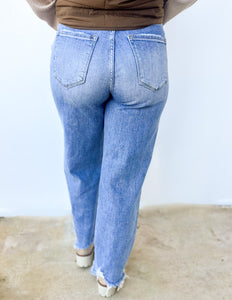 The Aftermath Distressed Hem Straight Leg Jeans in Denim Blue