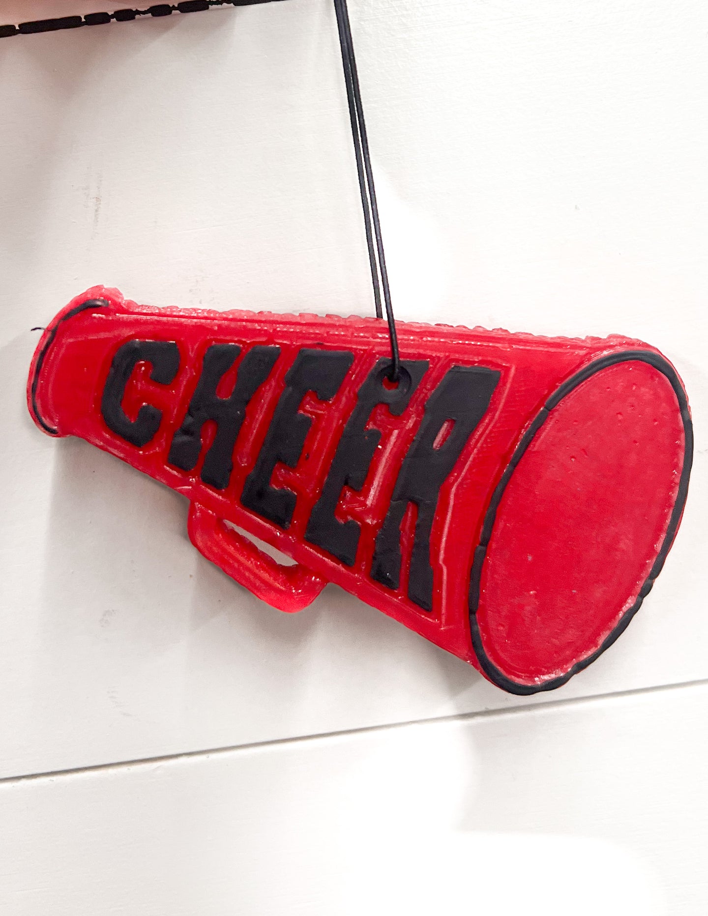 Red & Black Cheer Megaphone Car Freshie in Coffee Shop