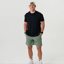 Load image into Gallery viewer, Burlebo Everyday Shorts in Light Sage with Fish Toss Pocket